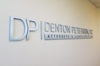 Brushed metal lobby signs