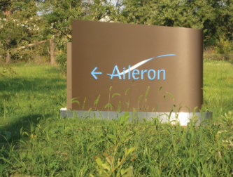 Too much foliage in front of exterior business signs in Gilbert AZ