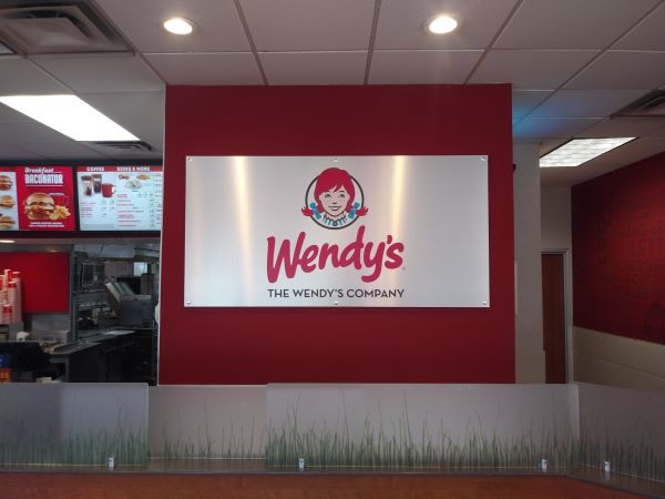 Franchise signs for local restaurants