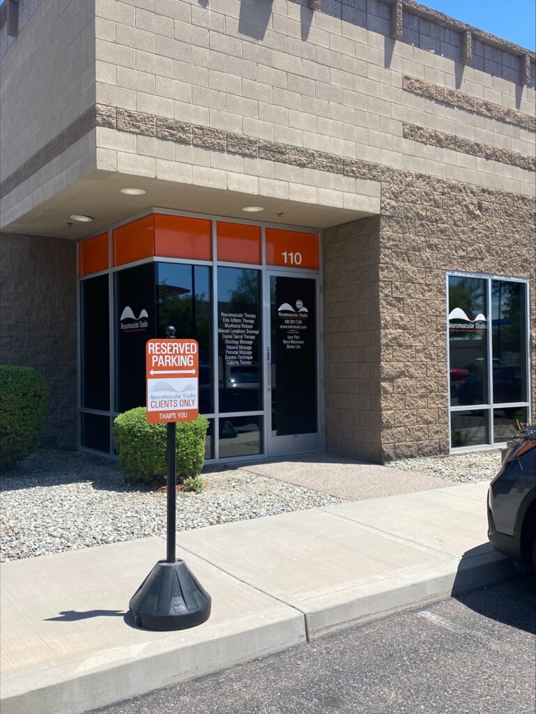 Portable Customer Parking Signs Reserve Spaces at The Neuromuscular Studio