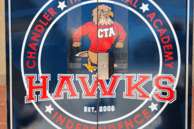 The Chandler Traditional Academy Advertises Using Door Wraps With Perforated Window Graphics in Chandler, AZ